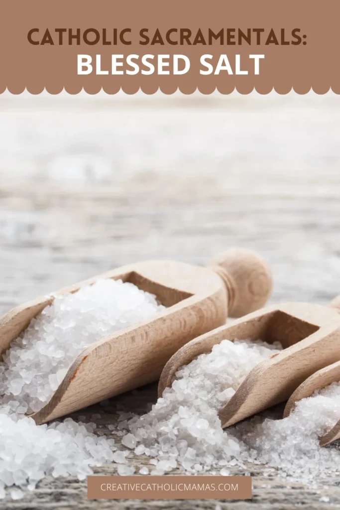 Catholic sacramentals blessed salt displayed in wooden scoops on a neutral background