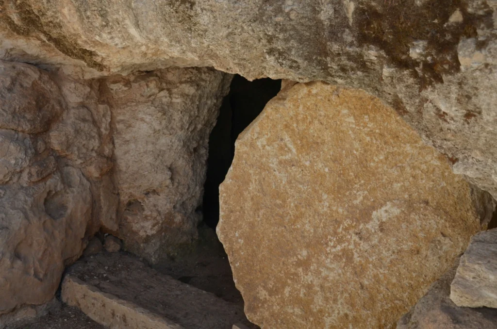 The empty tomb with the stone rolled away symbolizing the resurrection of Jesus